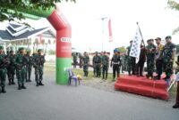 Mayor Jenderal TNI Niko Fahrizal, M.Tr.(Han), yang diwakili Komandan Korem 011/Lilawangsa (Danrem 011/LW), Kolonel Inf Ali Imran, memimpin Upacara Penyerahan Simbol dan Pemberangkatan Peleton Beranting Yudha Wastu Pramuka Jaya Tahun Anggaran 2024. 