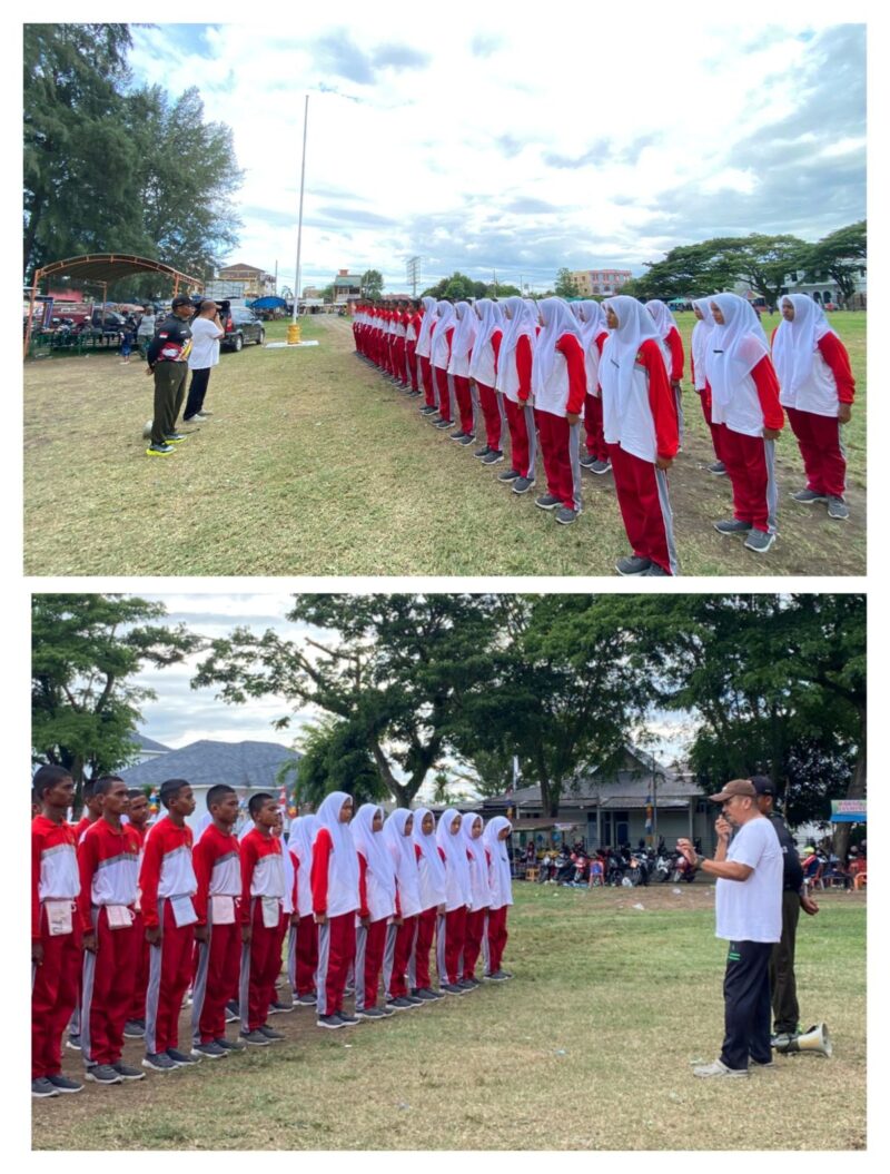 Mahmudi, SS, MPA,. Kepala Badan Kesatuan Bangsa dan Politik (Bakesbangpol) Kabupaten Pidie Jaya. Di dampingi salah satu pelatih dari TNI.(09/8/2025) Foto.ist.