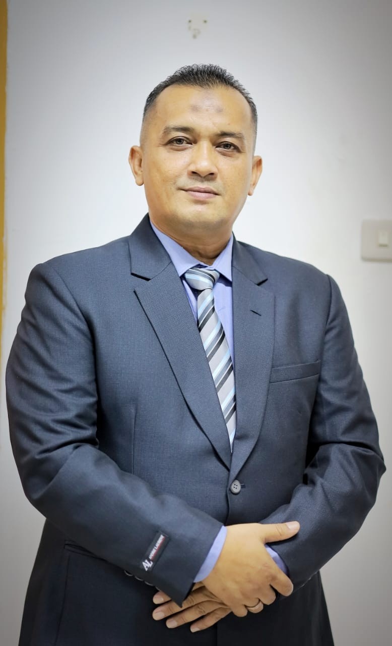 Mahmudi, SS, MPA, Kepala Badan Kesbangpol Pidie Jaya .( Foto.Dok)