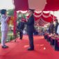 Kapolres Pidie Jaya, AKBP Ahmad Faisal Pasaribu, S.H., S.I.K., M.H., Inspektur Upacara di Lapangan Bola Kaki Kota Meureudu . Minggu 17-08-2025. Sore ( Foto.ist)