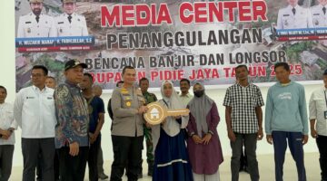 Wujud Kepedulian Pascabencana, Polres Pidie Jaya Kawal Peresmian 212 Unit Huntara di Meureudu