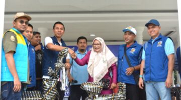 Duo Nur Beruntung, Dua IRT Bawa Pulang Sepeda Listrik di Jalan Sehat KNPI Langsa
